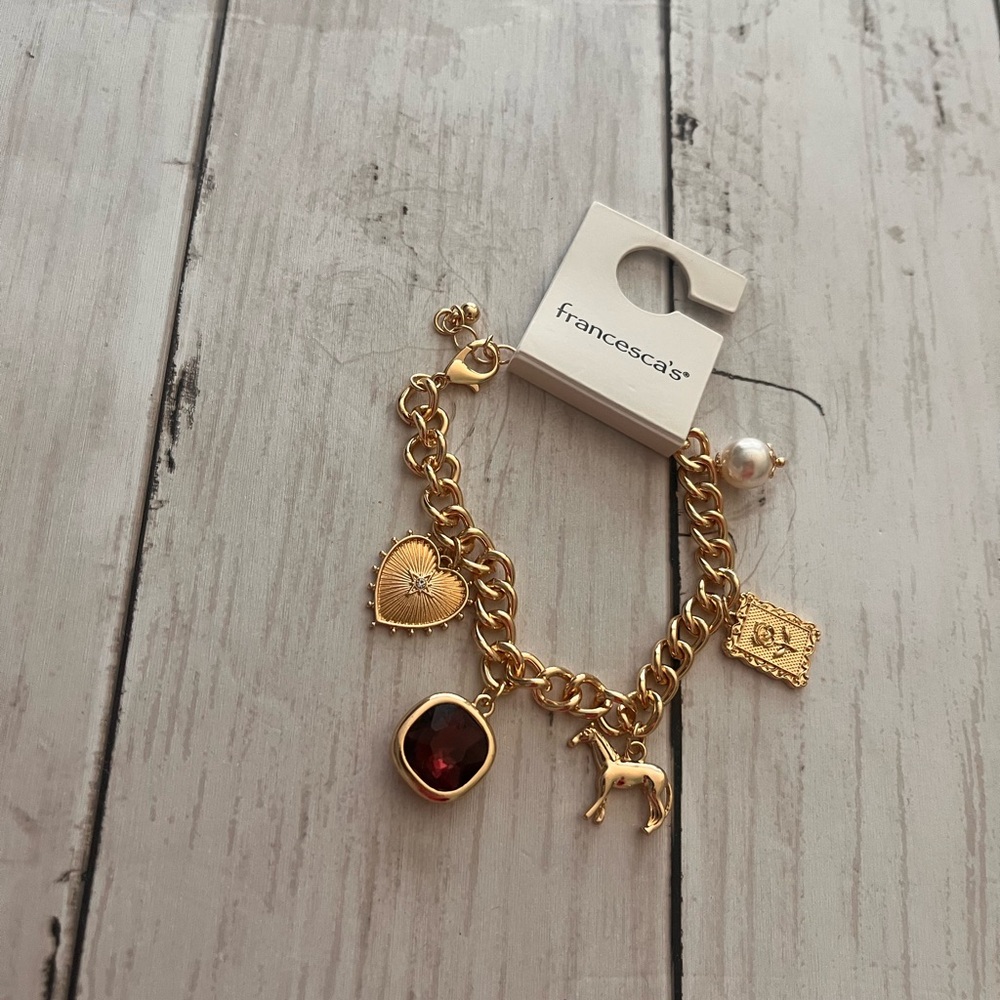 Francesca's Collections Gold Bracelet with Red Gem and Charms - Picture 3 of 4